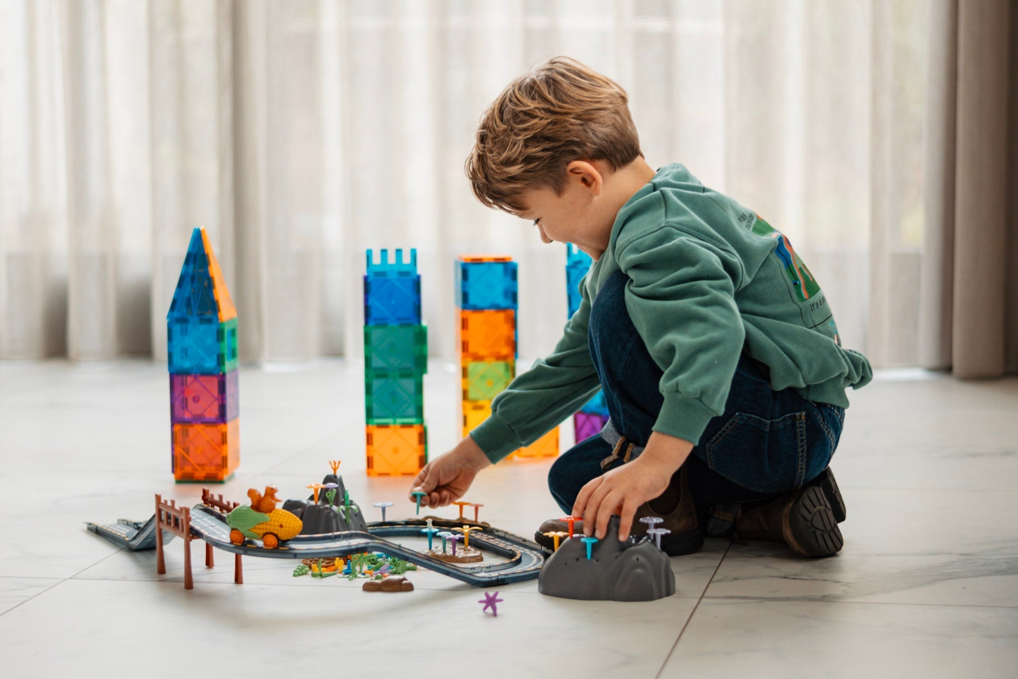 Samen bouwen met tegels, blokken en de racebaan